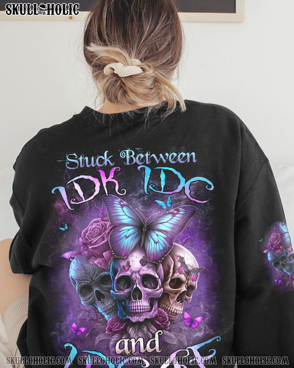 STUCK BETWEEN IDK IDC AND IDGAF BUTTERFLY SKULL ALL OVER PRINT – TLNZ0202233